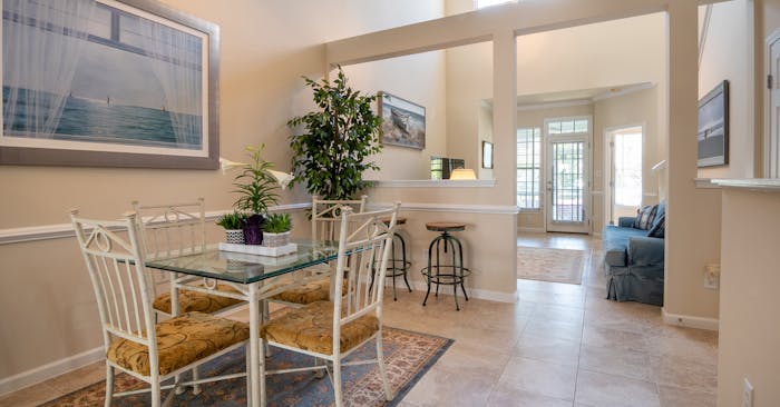 Dining area of home that is open, clean and full of light. 